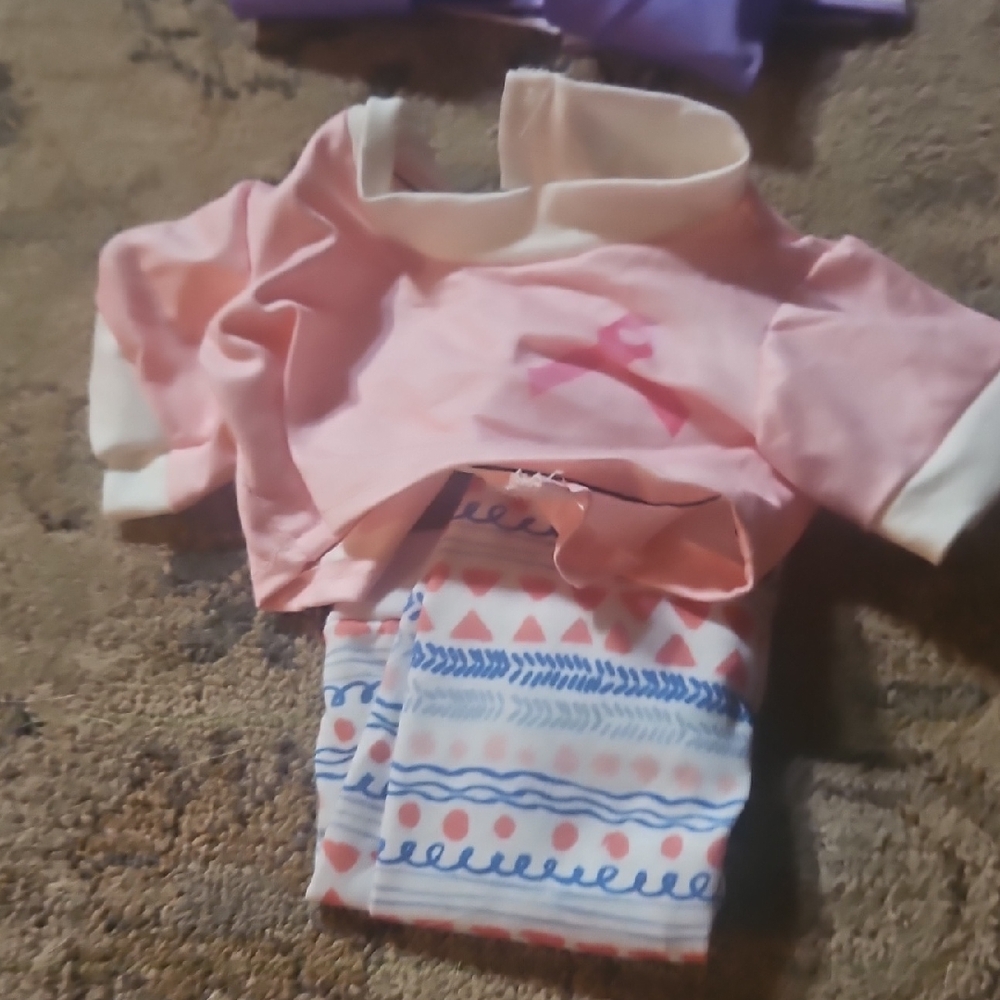 Pink and White Baby Outfit with Patterned Pants